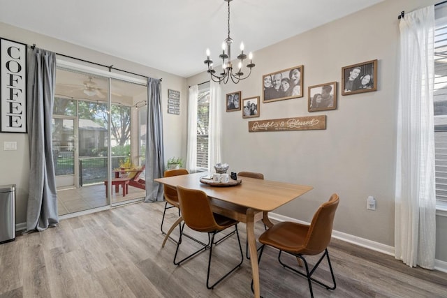 116 Buttercup Trl, Georgetown, TX 78633 - dining room featuring wood finished floors and a chandelier