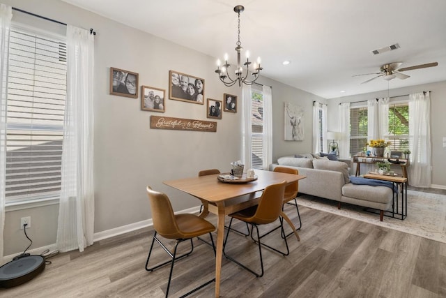 116 Buttercup Trl, Georgetown, TX 78633 - dining room featuring light wood-type flooring, plenty of natural light, a chandelier, and recessed lighting
