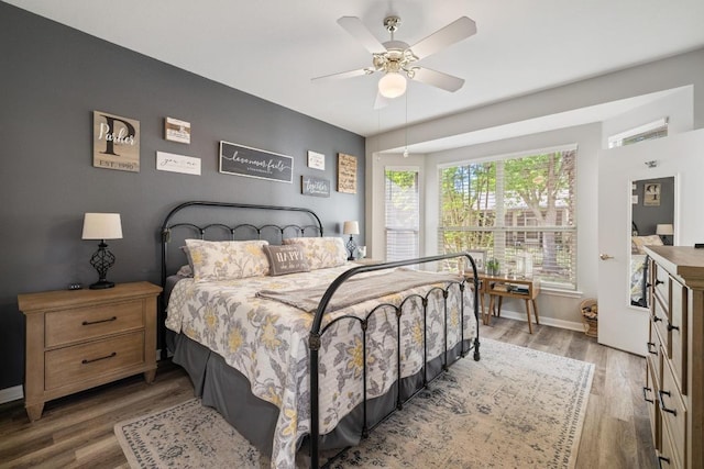 116 Buttercup Trl, Georgetown, TX 78633 - bedroom featuring light wood-type flooring and a ceiling fan