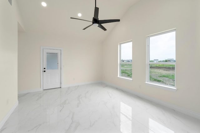 459 Rancho Linda Dr, Lockhart, TX 78644 - spare room featuring baseboards, recessed lighting, ceiling fan, high vaulted ceiling, and marble finish floor