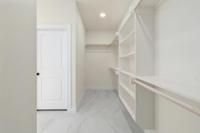 459 Rancho Linda Dr, Lockhart, TX 78644 - spacious closet featuring marble finish floor