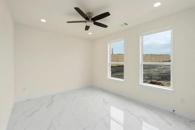 459 Rancho Linda Dr, Lockhart, TX 78644 - unfurnished room featuring visible vents, baseboards, recessed lighting, and marble finish floor