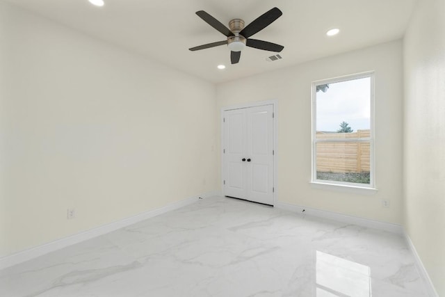 459 Rancho Linda Dr, Lockhart, TX 78644 - spare room featuring visible vents, baseboards, ceiling fan, recessed lighting, and marble finish floor