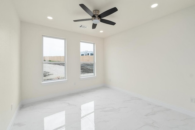 459 Rancho Linda Dr, Lockhart, TX 78644 - unfurnished room featuring marble finish floor, baseboards, visible vents, and recessed lighting