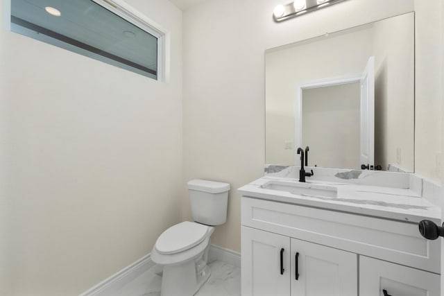 459 Rancho Linda Dr, Lockhart, TX 78644 - half bath featuring toilet, marble finish floor, vanity, and baseboards