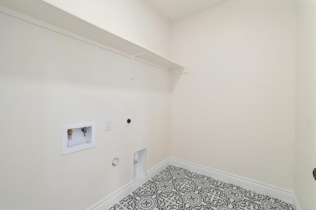 459 Rancho Linda Dr, Lockhart, TX 78644 - laundry room with electric dryer hookup, baseboards, gas dryer hookup, washer hookup, and laundry area