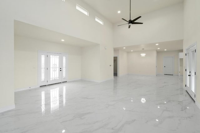 459 Rancho Linda Dr, Lockhart, TX 78644 - empty room featuring baseboards, marble finish floor, and a ceiling fan