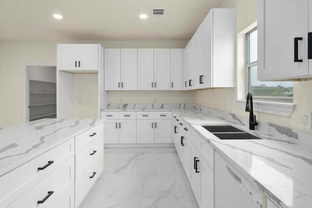 459 Rancho Linda Dr, Lockhart, TX 78644 - kitchen with recessed lighting, visible vents, white dishwasher, marble finish floor, and a sink