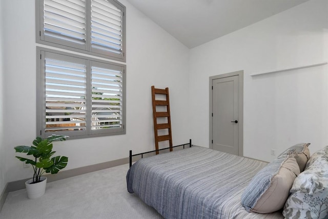 608B W 15th St, Georgetown, TX 78626 - carpeted bedroom with lofted ceiling and baseboards