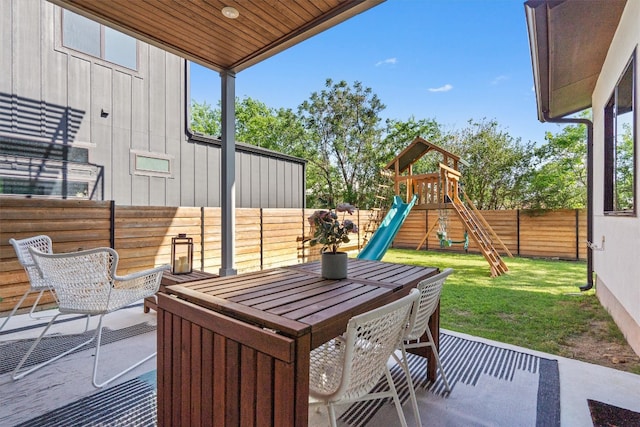 608B W 15th St, Georgetown, TX 78626 - view of patio / terrace with outdoor dining space and a playground