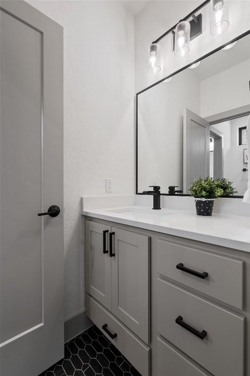 608B W 15th St, Georgetown, TX 78626 - bathroom featuring vanity and tile patterned flooring