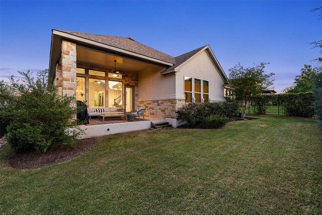 234 Sumalt Gap Way, Lakeway, TX 78738 - rear view of property with stone siding, stucco siding, and ceiling fan