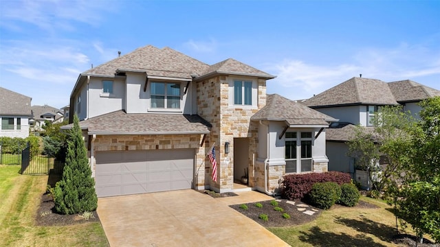 234 Sumalt Gap Way, Lakeway, TX 78738 - view of front of home featuring stone siding, stucco siding, a garage, driveway, and roof with shingles