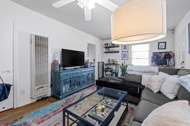 5708 Ave F, Austin, TX 78752 - living room with a heating unit, wood finished floors, and a ceiling fan