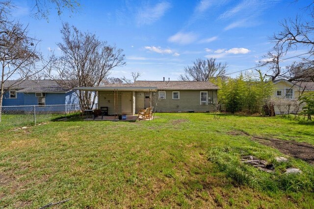 5708 Ave F, Austin, TX 78752 - back of house with a fenced backyard, a patio, and crawl space