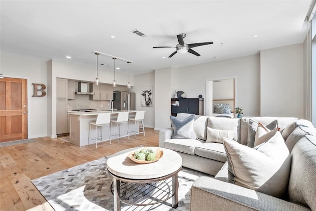 1600 Barton Springs Rd Unit 5503, Austin, TX 78704 - living room featuring recessed lighting, light wood-style floors, and a ceiling fan