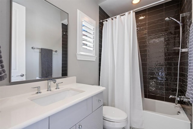 1015 Juniper St, Austin, TX 78702 - bathroom featuring toilet, shower / bath combo with shower curtain, and vanity