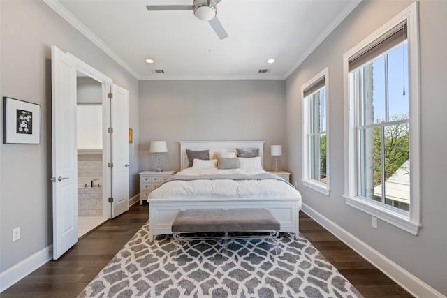 1015 Juniper St, Austin, TX 78702 - bedroom featuring ornamental molding, dark wood-style floors, and baseboards