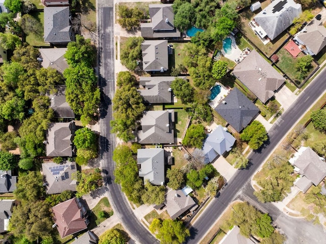 12528 E Labrador Cv, Austin, TX 78729 - aerial view of property and surrounding area featuring nearby suburban area and a pool