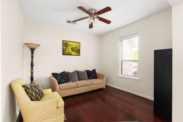 12528 E Labrador Cv, Austin, TX 78729 - living area featuring dark wood-style floors and ceiling fan