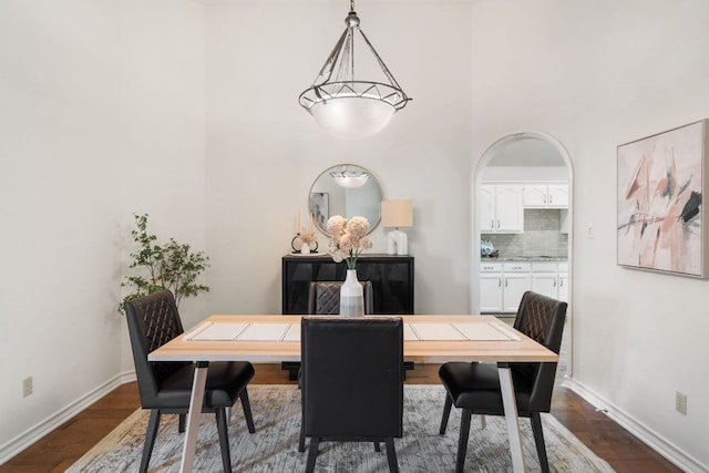 30203 Hacienda Ln, Georgetown, TX 78628 - dining room featuring a high ceiling and dark wood-type flooring