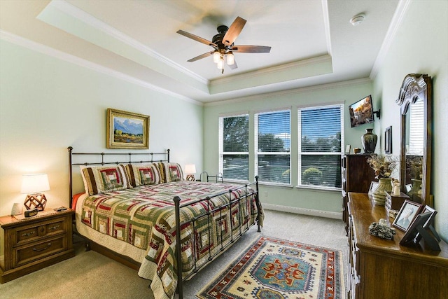 603 Archer Ln, Georgetown, TX 78633 - carpeted bedroom with ceiling fan, baseboards, ornamental molding, and a raised ceiling