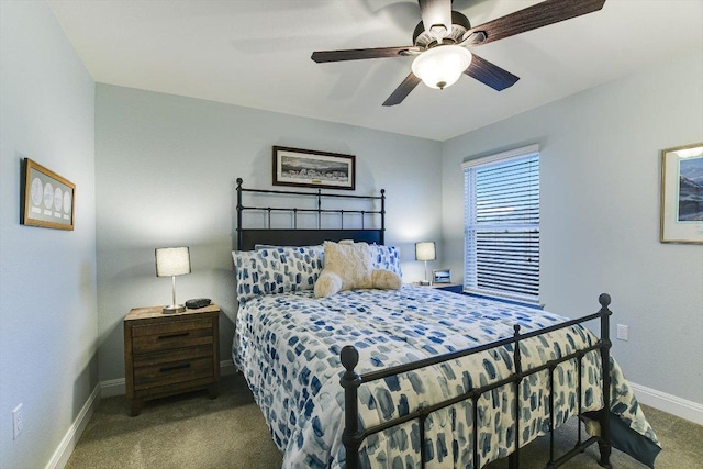 603 Archer Ln, Georgetown, TX 78633 - carpeted bedroom with baseboards and a ceiling fan
