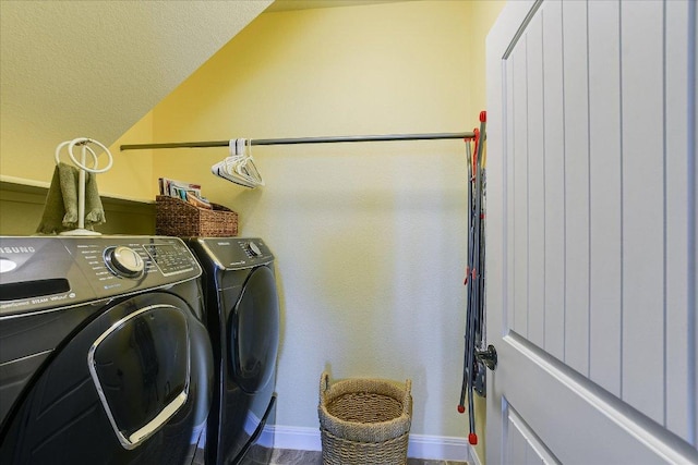 603 Archer Ln, Georgetown, TX 78633 - clothes washing area with baseboards, washer and dryer, and laundry area
