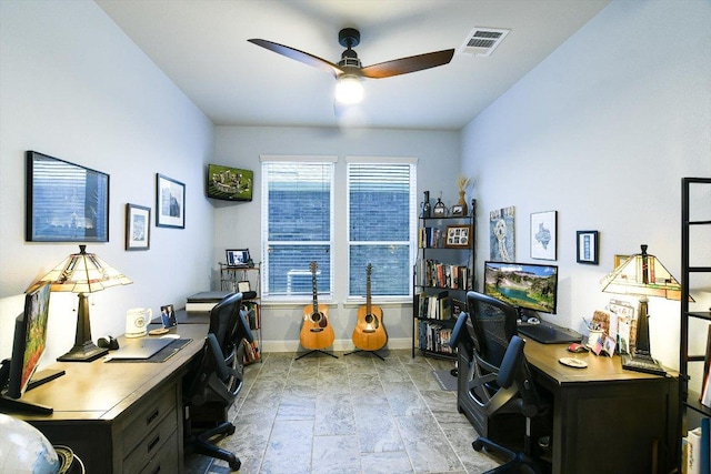 603 Archer Ln, Georgetown, TX 78633 - office space featuring stone finish flooring, visible vents, baseboards, and ceiling fan