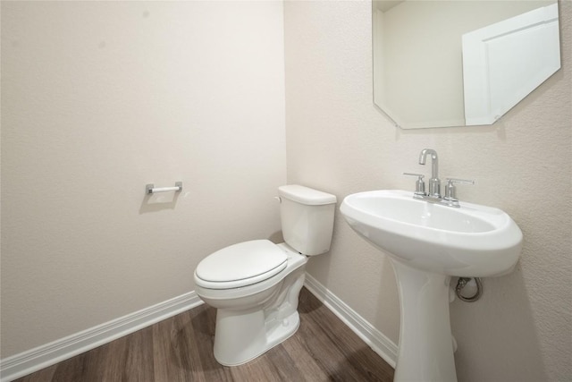 1850 Settlers Glen Dr Unit 904, Round Rock, TX 78665 - half bath with toilet, wood finished floors, and baseboards
