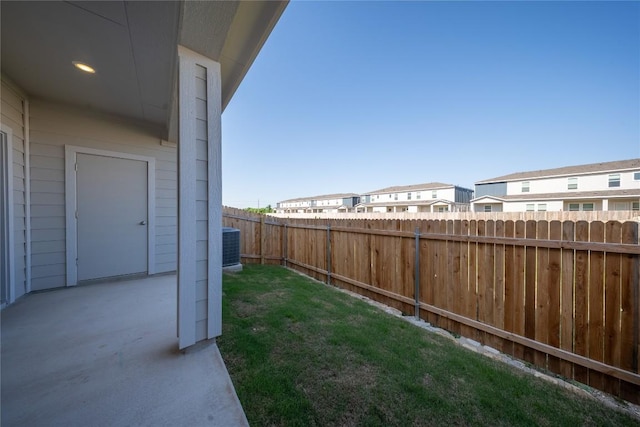 1850 Settlers Glen Dr Unit 904, Round Rock, TX 78665 - view of yard with a fenced backyard, a residential view, cooling unit, and a patio
