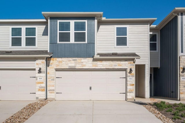 1850 Settlers Glen Dr Unit 904, Round Rock, TX 78665 - multi unit property featuring a garage, stone siding, and concrete driveway