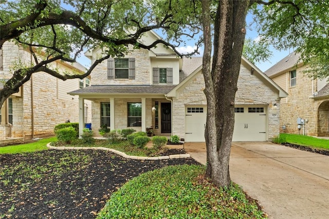 4014 Remington Rd, Cedar Park, TX 78613 - view of front facade with stone siding, concrete driveway, a garage, and a shingled roof