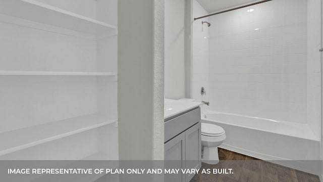 full bath featuring shower / washtub combination, vanity, toilet, and wood finished floors