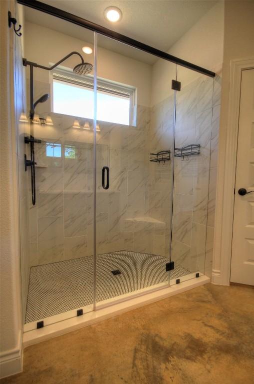 283 Calle Cortez Dr, Buchanan Dam, TX 78609 - full bathroom with recessed lighting and a stall shower