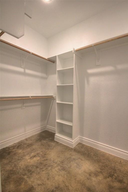 283 Calle Cortez Dr, Buchanan Dam, TX 78609 - walk in closet featuring dark carpet
