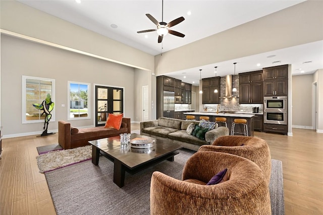 607 Flint Ridge Trl, Georgetown, TX 78628 - living area featuring recessed lighting, light wood finished floors, and ceiling fan