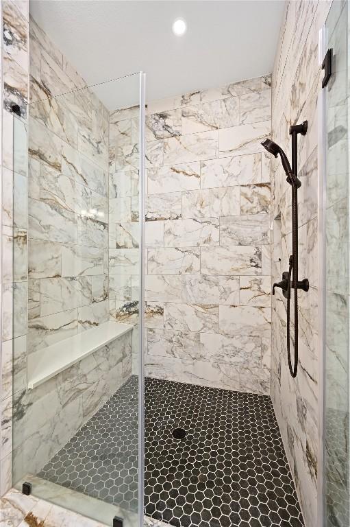 607 Flint Ridge Trl, Georgetown, TX 78628 - bathroom featuring a shower stall and recessed lighting