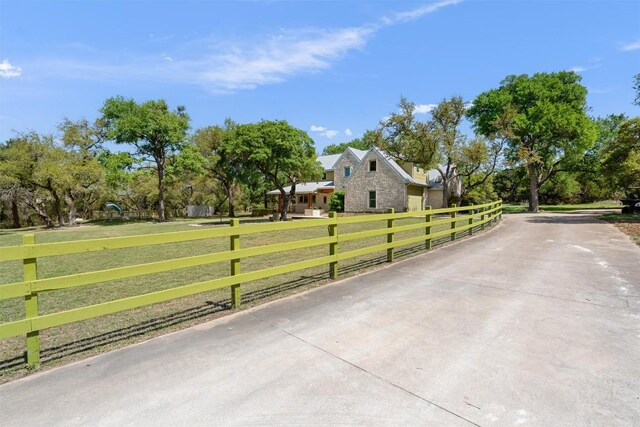 33 Long Creek Rd, Austin, TX 78737 - view of concrete driveway with view of scattered trees