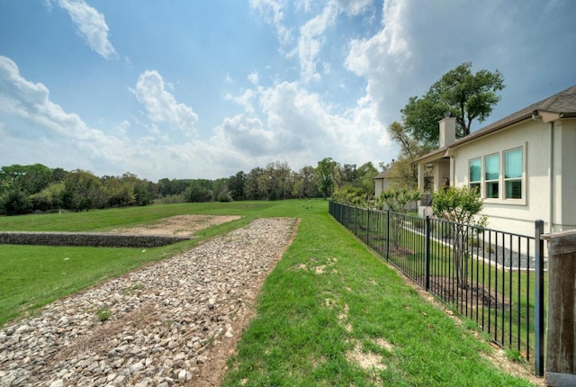 view of yard with fence