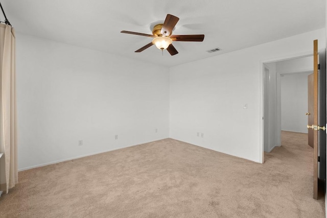 21459 Coyote Trl Unit B4, Lago Vista, TX 78645 - unfurnished bedroom with light carpet and ceiling fan