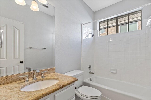 8312 Jancy Dr, Austin, TX 78750 - bathroom featuring vanity and shower / bathtub combination