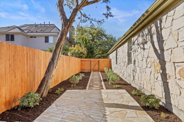 8312 Jancy Dr, Austin, TX 78750 - fenced backyard with a patio area