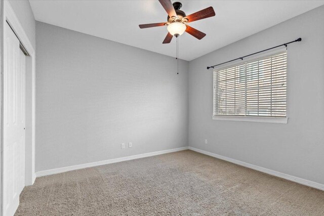 8312 Jancy Dr, Austin, TX 78750 - unfurnished bedroom with a closet, carpet, and a ceiling fan