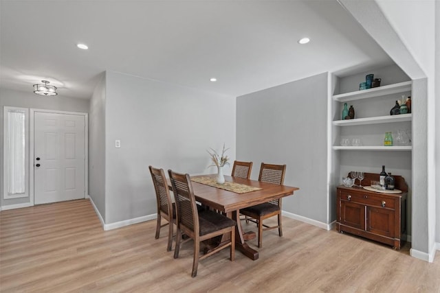 11605 Gunsmoke Cir, Austin, TX 78750 - dining space featuring light wood finished floors, baseboards, and recessed lighting
