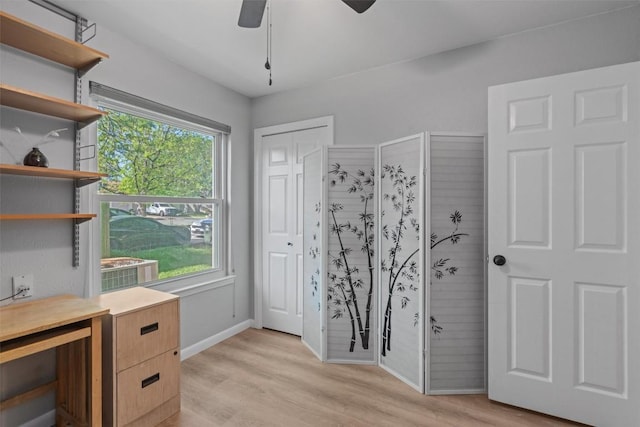 11605 Gunsmoke Cir, Austin, TX 78750 - office space with light wood-style floors, ceiling fan, and baseboards