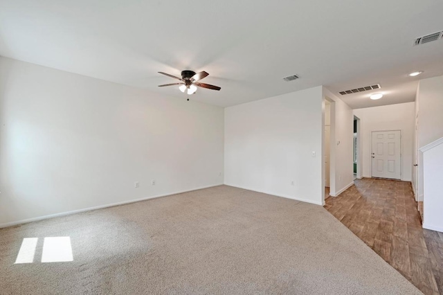 234 Coleto Creek Loop, Kyle, TX 78640 - empty room featuring a ceiling fan, carpet floors, and baseboards