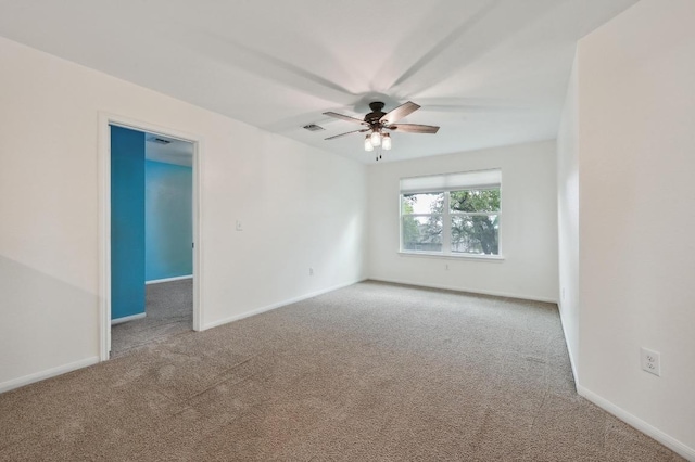 234 Coleto Creek Loop, Kyle, TX 78640 - carpeted empty room with a ceiling fan and baseboards