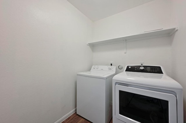 234 Coleto Creek Loop, Kyle, TX 78640 - laundry room with independent washer and dryer, baseboards, and wood finished floors