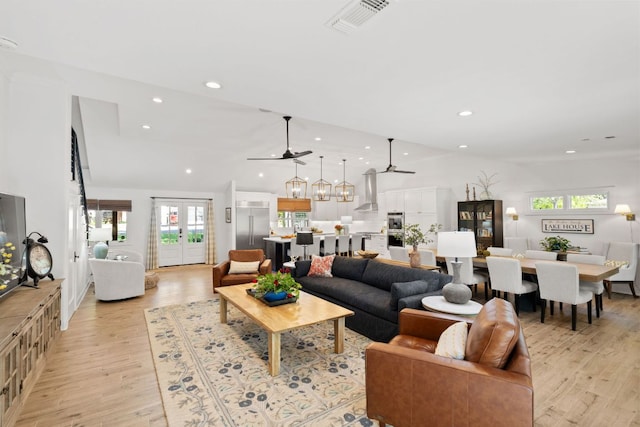 1001 Lakeshore Dr, Marble Falls, TX 78654 - living room with ceiling fan, light wood finished floors, recessed lighting, and a healthy amount of sunlight